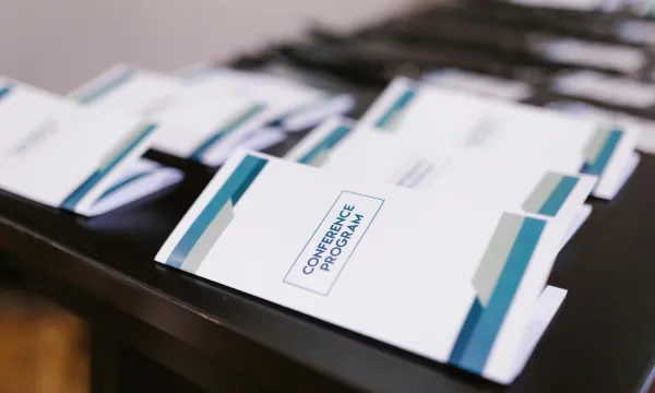 Stack of printed brochures on a table